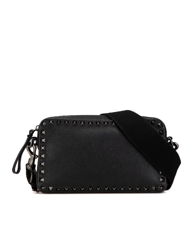 Elegant women's bags with woven texture and metallic chain strap for sophisticated look-Grainy Calfskin Studded Crossbody Bag with Adjustable Strap