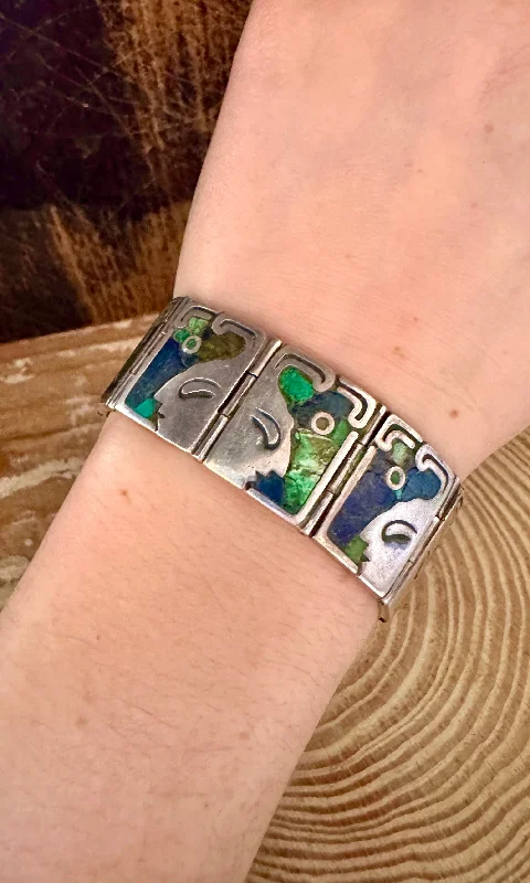 Bangles with peacock ore for iridescent glow -LOS CASTILLO 60s Lapis and Turquoise Sterling Silver Aztec Bracelet