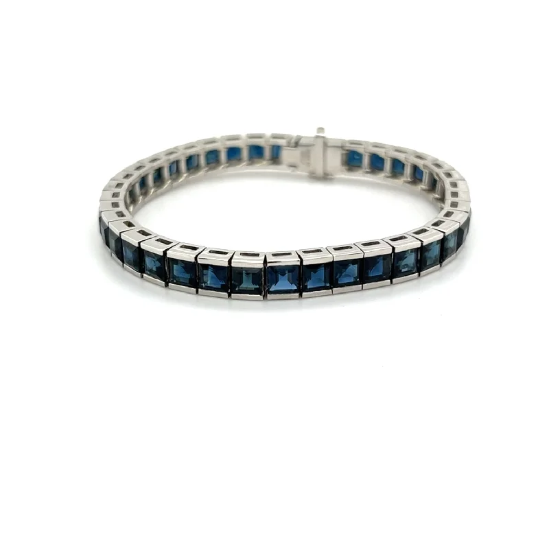 Bangles with hammered silver for rustic appeal -Platinum Tennis Bracelet with Blue Sapphires