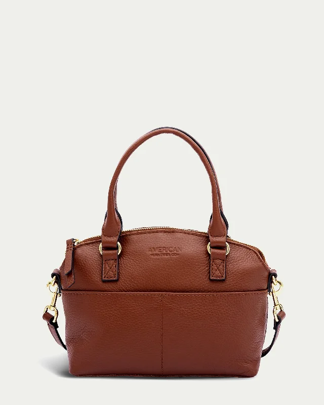 Women's bags with vintage-inspired design and rich leather texture for classic style-Carrie Mini Dome Crossbody