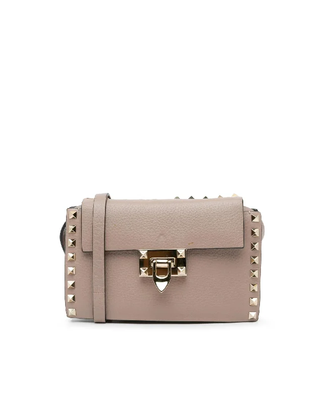 Women's bags with sleek and modern design and minimalist silhouette for sophisticated style-Rockstud Leather Flap Crossbody Bag with Stud Details