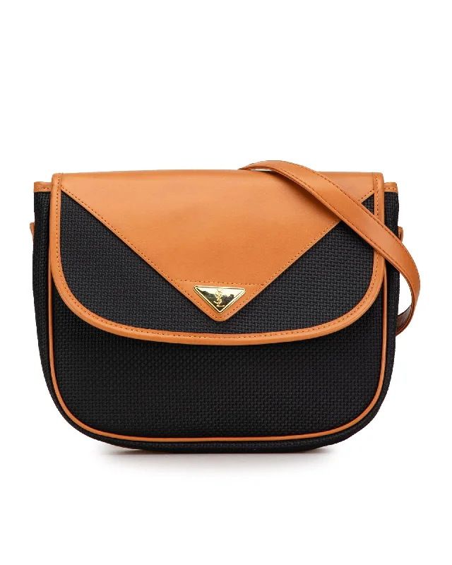 Women's bags with subtle branding and premium material for refined, understated elegance-Coated Canvas Crossbody Bag with Leather Trim and Adjustable Strap