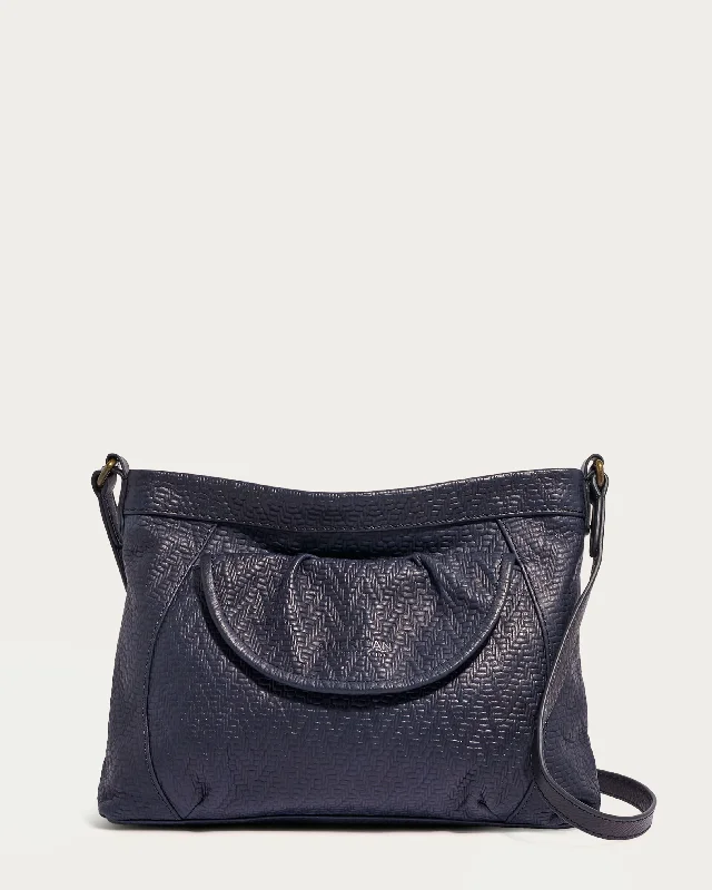 Women's bags with shiny metallic accents and sleek design for evening glamour-Reed Crossbody