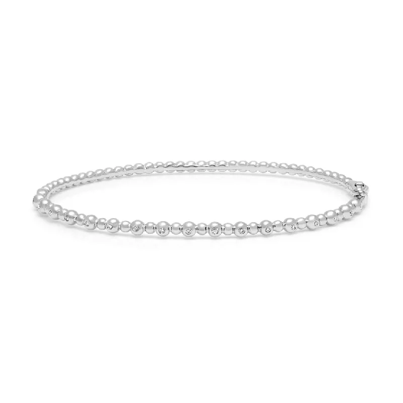 Bracelets with spiral designs for eye-catching twist -0.06 ctw Diamond Bangle Bracelet