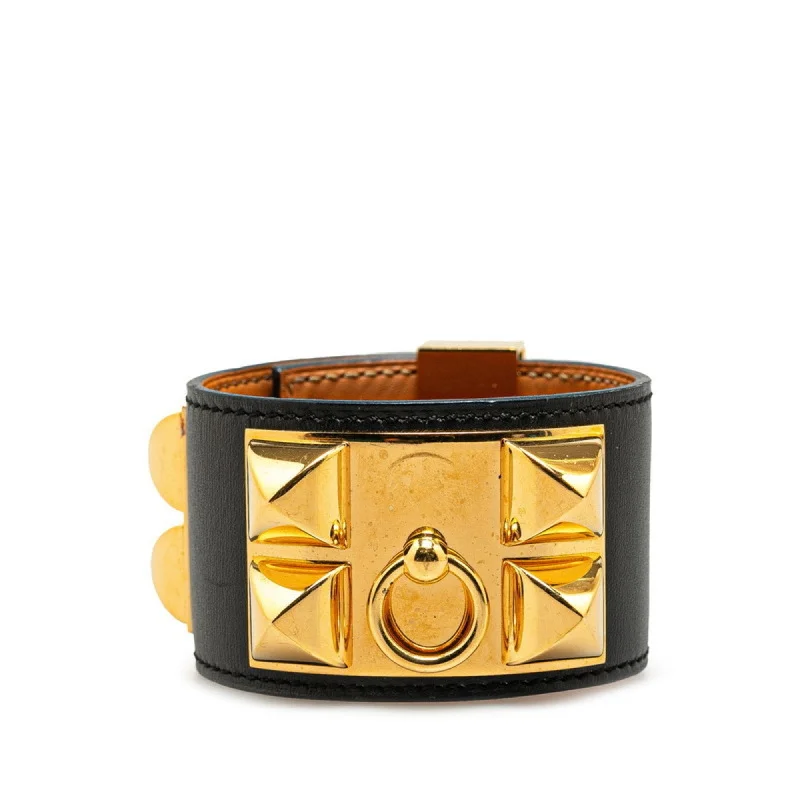 Bangles with bold onyx stones for contrast -Hermes   Leather Charm Bracelet (Pre-Owned)