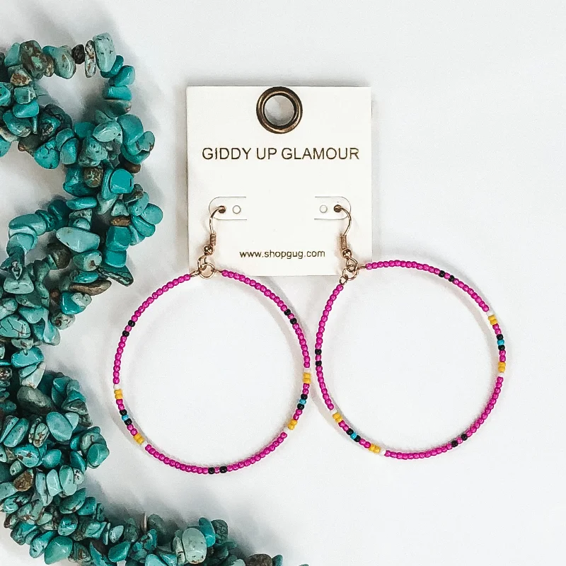 Hoop earrings with hammered copper for a warm and rustic aesthetic-Circle Beaded Dangle Earrings in Fuchsia