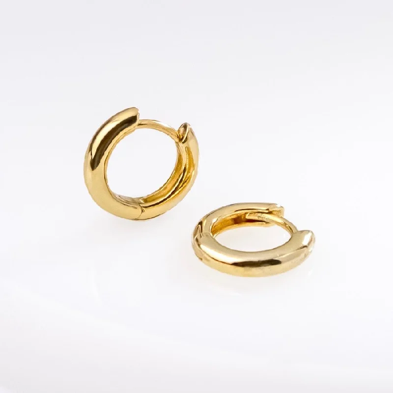 Hoop earrings with a chunky design for a bold and trendy statement-Classic Gold 7mm Baby Huggie Earrings