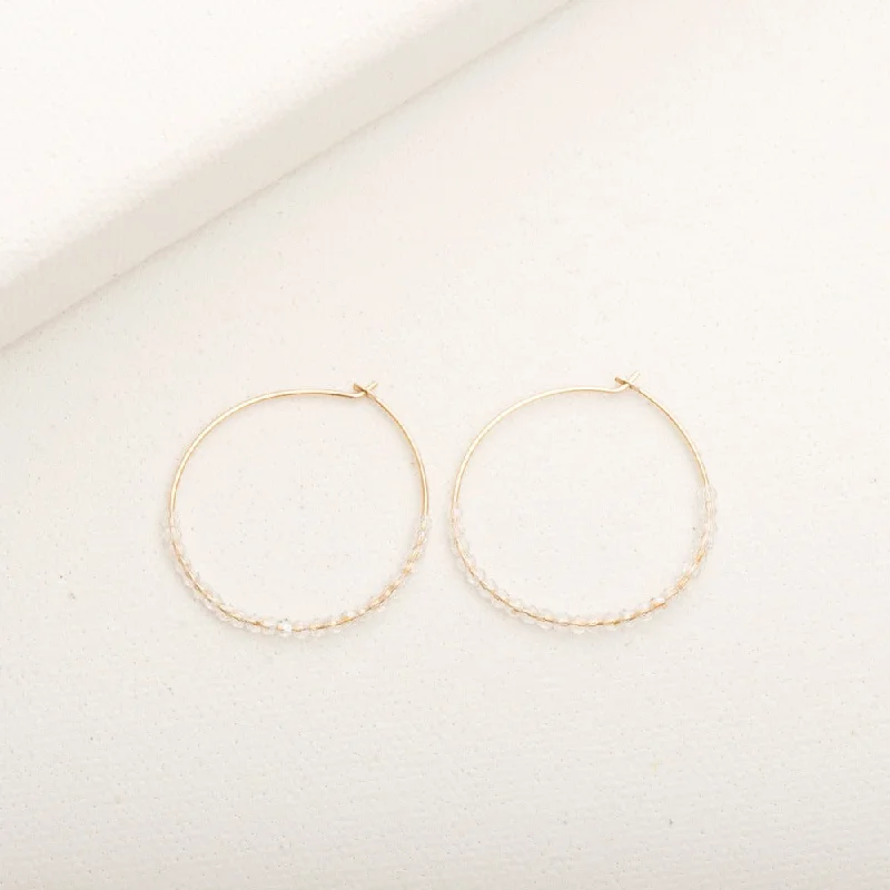 Hoop earrings with braided patterns for a detailed and textured finish-Crystalline Hoop