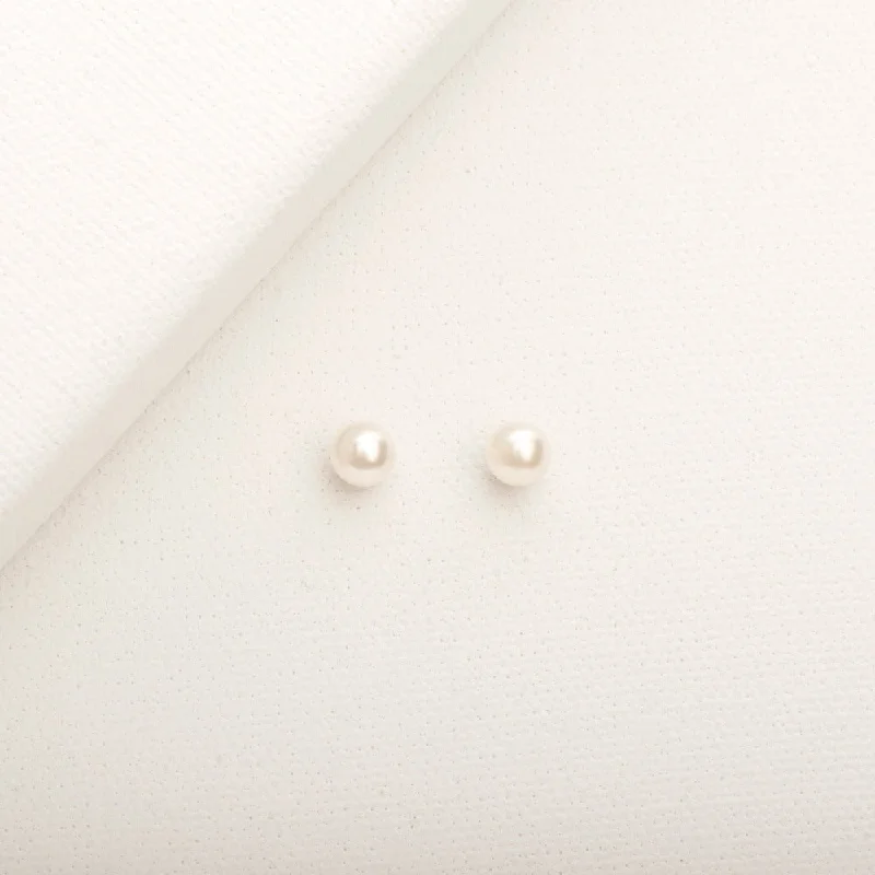 Hoop earrings with diamond-cut surfaces for added sparkle and shine-Crystal Pearl Studs